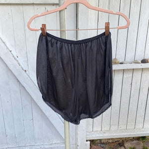 black satin shorts