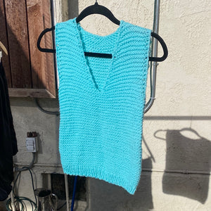 Blue knitted sweater vest