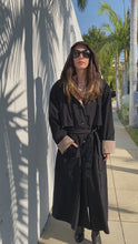 Load and play video in Gallery viewer, Vintage 90s Black Trench Coat with Hood
